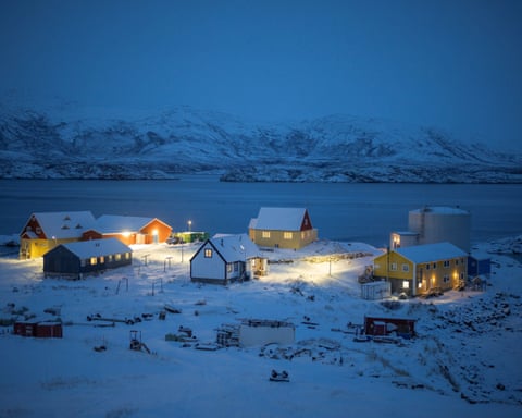 Lights illuminate the village of Kapisillit, Greenland.