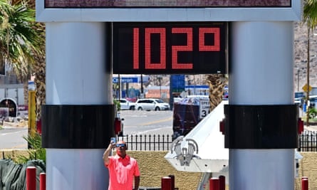 Sign showing temperature reading 102F