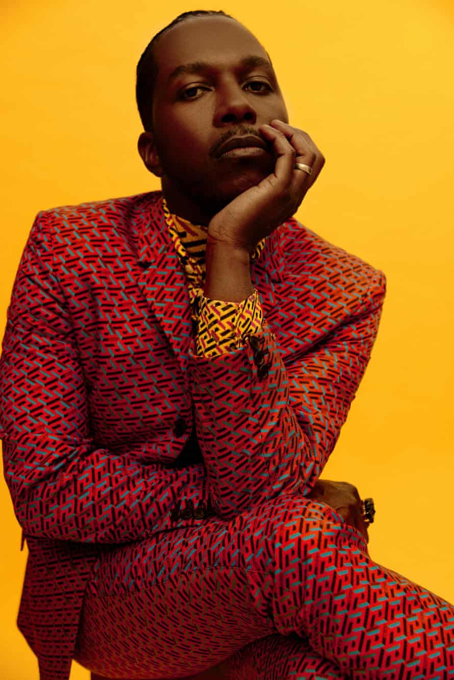 Leslie Odom Jr in an op art Versace suit.