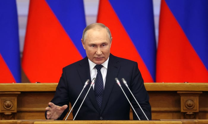 Vladimir Putin gives a speech at a meeting of advisory council of the Russian parliament in St Petersburg.