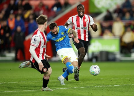 Adam Armstrong of Wolverhampton Wanderers scores his team's first goal.