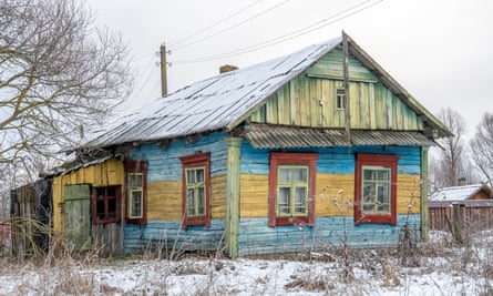 A colourfully decorated log home in Kudrychy village near the town of Pinsk in Brest region. The village is located on the fringe of the Middle Pripyat Reserve.