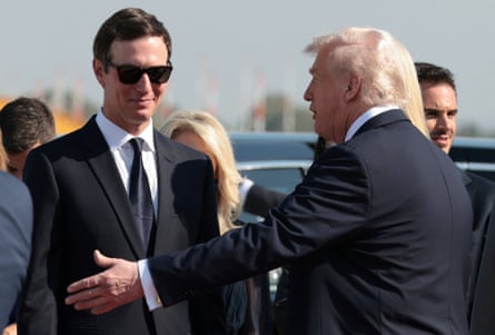 Kushner, wearing sunglasses, smiles at Trump