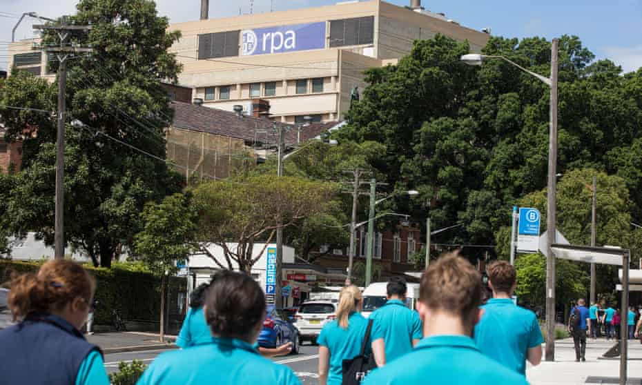 Staff from Royal Prince Alfred hospital walk to work
