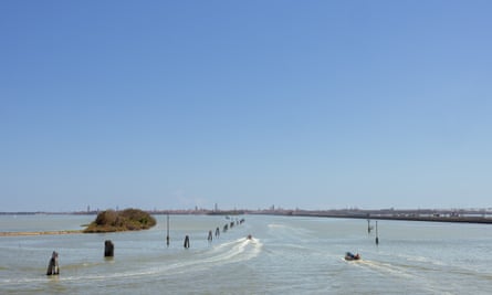 A View of the Venetian lagoon seen from Mestre. To a Venetian, owning a boat is almost like owning a car.