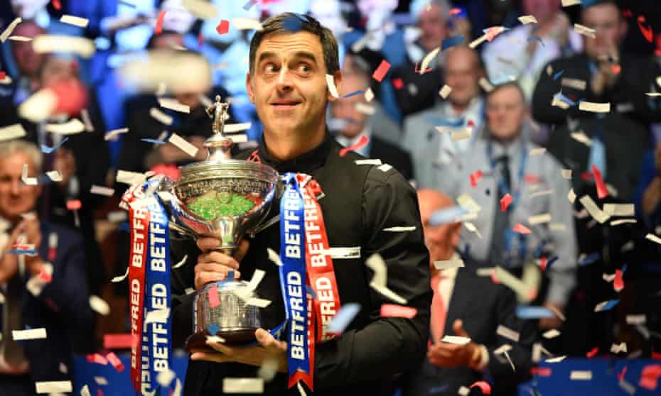 Ronnie O'Sullivan poses with the trophy after his superb form in the evening session saw off Judd Trump in the 2022 World Championship Snooker final.