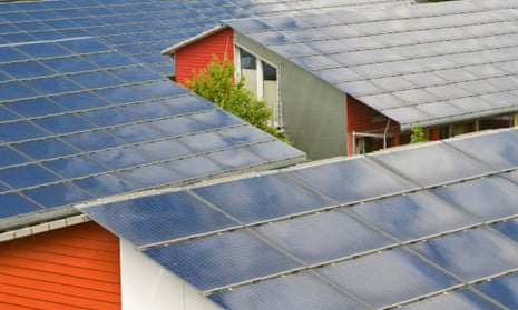 Solar roofs in Freiburg, Baden-Wuerttemberg, Germany show that green building standards could cut electricity use. 