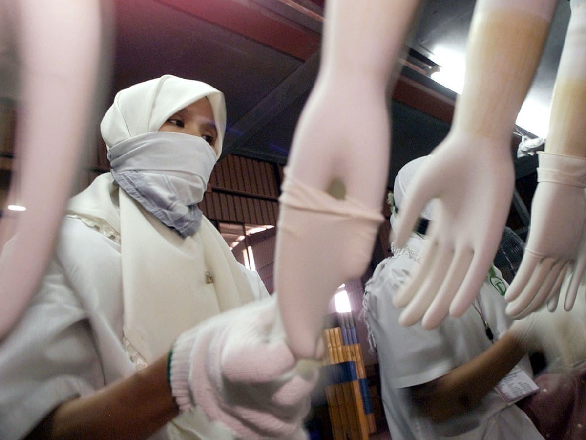 Nhs Rubber Gloves Made In Malaysian Factories Linked With Forced Labour Global Development The Guardian