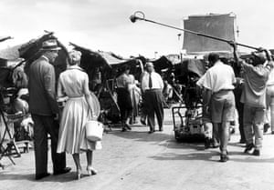 Alfred Hitchcock directs Doris Day and James Stewart on set of the 1956 thriller The Man Who Knew Too Much