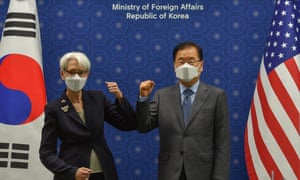 US deputy secretary of state, Wendy Sherman, and South Korea’s foreign minister, Chung Eui-yong, bump elbows at the foreign ministry in Seoul today.