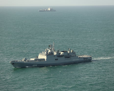 Russian frigate Admiral Grigorovich sails across calm waters with another ship in the distance