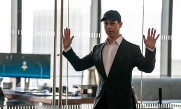 Jeremy Strong wearing a baseball cap and a suit  as Kendall Roy in HBO's Succession