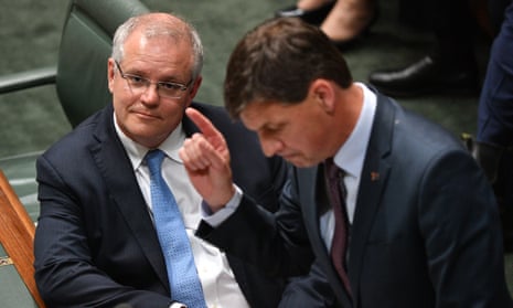 Scott Morrison (left) energy minister Angus Taylor during question time. The prime minister said Australia would meet its Paris targets largely based on investment in renewable energy technologies.