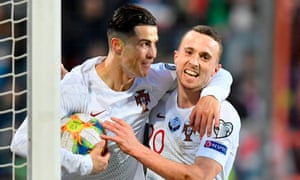 TOPSHOT-FBL-EURO-2020-QUALIFIER-LUX-POR<br>TOPSHOT - Portugal's forward Cristiano Ronaldo (L) celebrates after scoring a goal during the UEFA Euro 2020 Group B qualification football match between Luxembourg and Portugal at the Josy Barthel Stadium in Luxembourg on November 17, 2019. (Photo by JOHN THYS / AFP) (Photo by JOHN THYS/AFP via Getty Images)
