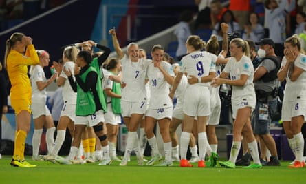England players celebrate their dramatic extra time victory over Spain.