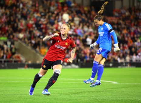 Manchester United's Leah Galton celebrates scoring their equaliser against Arsenal.