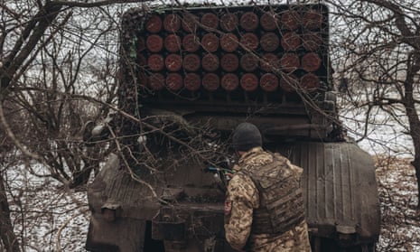 A Ukrainian soldier works on a Grad missile launcher near Soledar, in the Donetsk region.