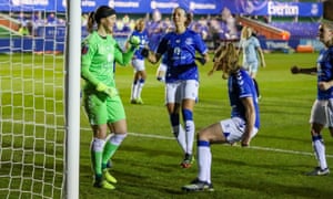 Everton keeper Tinja-Riikka Korpela is congratulated by her team mates after saving a penalty.