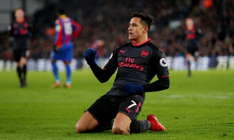 Arsenal’s Alexis Sanchez celebrates scoring the third goal.