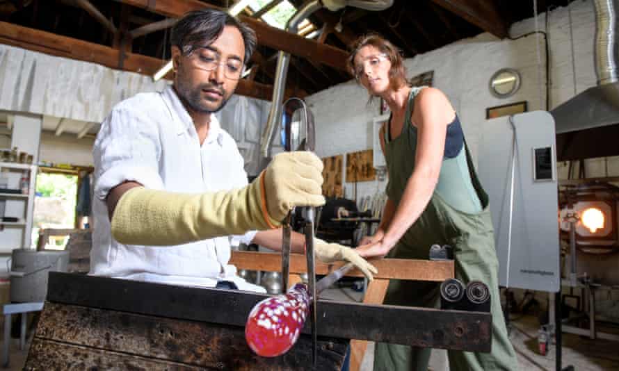 Rhik Samadder tries … glassblowing: ‘My tendons are burning – and it’s nothing to do with the glory hole’ 1 Rhik Samadder under the tutelage of KT.