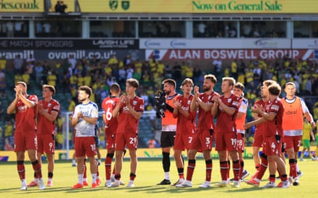 West Bromwich Albion players applaud the fans after the match.