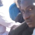 A video image of Mustafa Ibrahim on a truck on 27 October after being caught by the RSF as he attempted to flee El Fasher.
