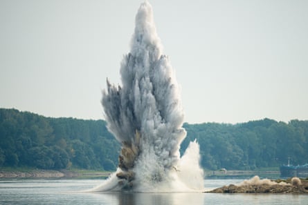 A huge explosion in the middle of a river.