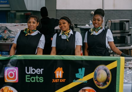 Three smiling caterers