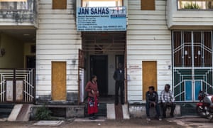Workers outside the office of advocacy group Jan Sahas in Dewas