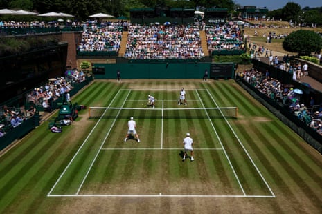 A view of Court 18 at Wimbledon while a men’s doubles game is taking place