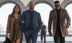 This image released by STXfilms shows Aubrey Plaza, from left, Jason Statham and Bugzy Malone in a scene from "Operation Fortune: Ruse de guerre." (Daniel Smith/STXfilms via AP)
