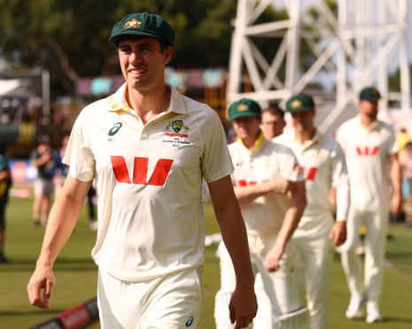 Pat Cummins leads Australia on to Marrara Stadium in Darwin during the first Test against Bangladesh