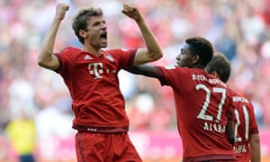 Thomas Müller celebrates after his last-gasp penalty for Bayern Munich.