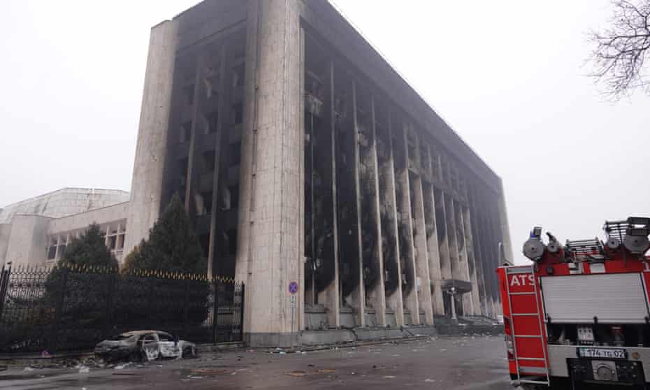 A burnt-out administrative building in central Almaty, after violence erupted following protests.
