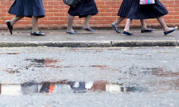Students leave Beis Malka school in north London, where women have been banned from driving children to school.
