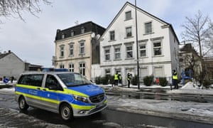 Police and security patrols at residential buildings, that are placed under quarantine after a major police operation took place last night to test for the coronavirus in Hamm, western Germany.