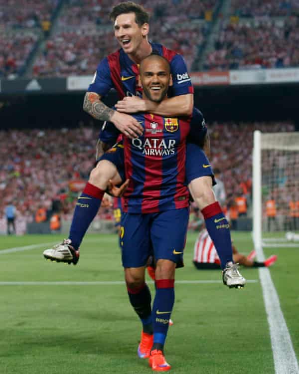 Lionel Messi and Dani Alves.
