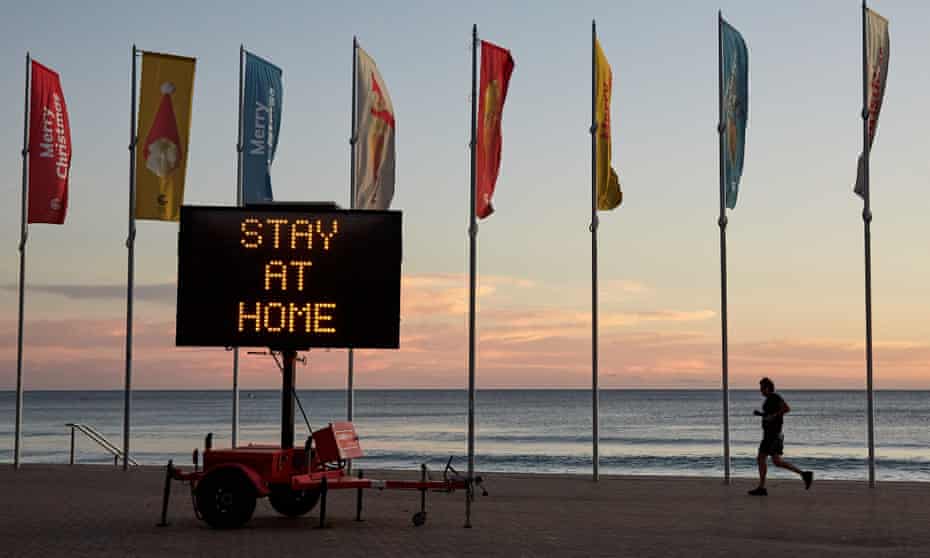 A COVID-19 digital sign is seen at Manly Beach on December 23, 2020 in Sydney, Australia.