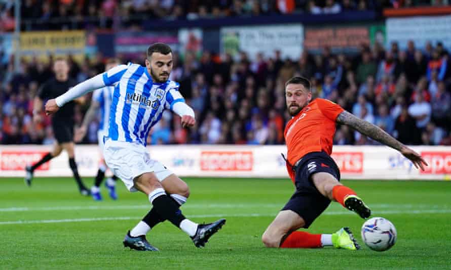 Huddersfield's Danel Sinani opens the scoring at Kenilworth Road.
