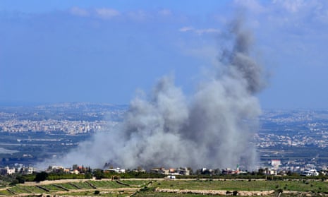 Smoke billows from the site of an Israeli airstrike on the villages of Mansouri and Majdelzoun near Lebanon's southern border.