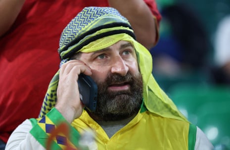 A Brazil fan is pictured inside the stadium.
