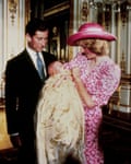 Princess Diana, Princess of Wales, and Prince Charles, Prince of Wales look on lovingly at baby Prince William on the day of his Christening at Buckingham Palace in 1982