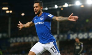 Theo Walcott celebrates after scoring his second against Leicester