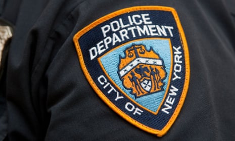 New York police department badge on a blue shirt