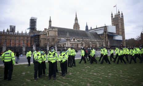 Police stand near Houses of Parliament
