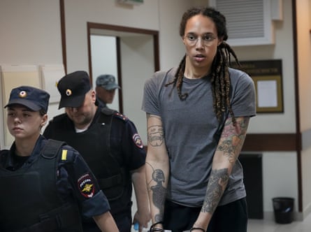 Brittney Griner is escorted from a courtroom after a hearing in Khimki on 4 August