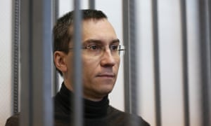 Alexei Kulikov, a former shareholder at Promsberbank, sits in the courtroom at Podolsk city court.