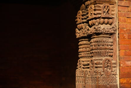 Closeup of carved wooden pillars