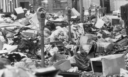 Hoxton Square in October 1970: parking meters stand amid piles of rubbish, accumulated because of a strike by council binmen. (Photo by Leonard Burt/Central Press/Getty Images)