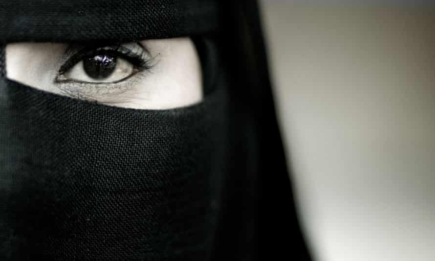Muslim woman wearing hijab.